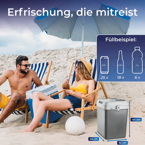 Kühl + Wärmebox 25L am Strand, ideale Kühloption für Getränke und Snacks, komfortabel und mobil.